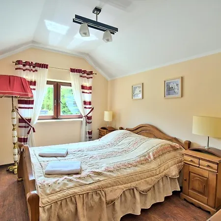 Nad Stawem Сasa de vacaciones Dzialdowo